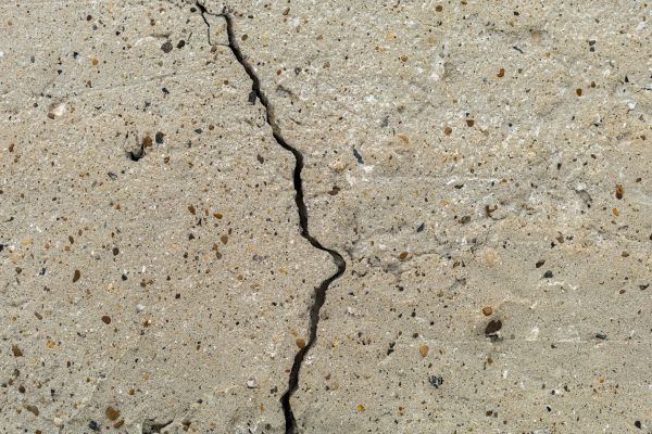 Cracked Basement Floor Repair in Lawrence